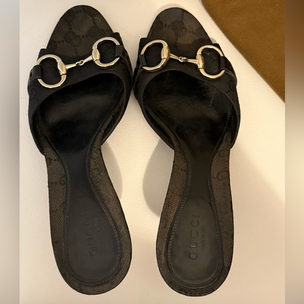 Gucci Black Mules with Gold Buckles